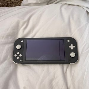 Mint condition Nintendo Switch plus charger.